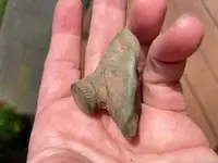 squished metal vial 1.webp