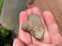 squished metal vial 2.webp