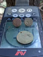 Pewter and Yellow Metal Anchor buttons and a NJ holed coin.webp