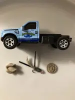 truck, folded penny, fly, face.webp