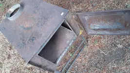 Tent stove front with door open.webp