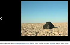 Meteorite on sand.jpg