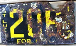 OldFortPak-1913-StLucieForHireLicensePlate-CleanedUp-Front-Full-1VNice.webp