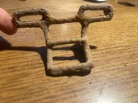 Some sort of strap buckle.webp