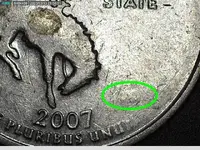 back of 2007 wyoming quarter circled.webp