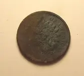 65 obverse peaking out.webp
