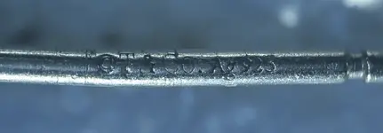 Ball earring marking.webp