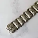 book chain bracelet.webp