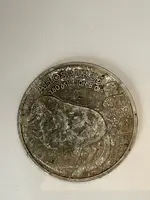 Dinosaur coin front.webp