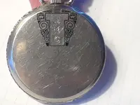 Waltham pocket watch back.webp