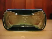 M on bottom of rosella omah sauce bottle.webp