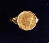 gold pesos ring.webp