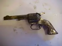Old toy gun.webp