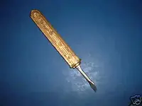 brass manicure tool.webp