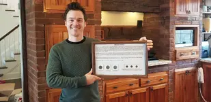 Joe holding case 2.webp