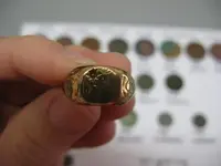 gold signet ring missing stone.webp