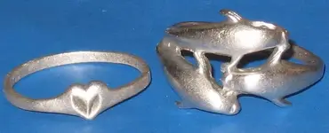 silver dolphins.webp