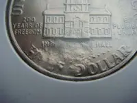 1976 struck through grease reverse closeup.webp