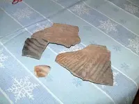 Scraper and pottery (400 x 300).webp