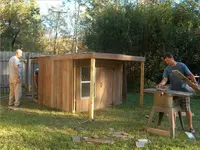 BuildingKylesCabin.webp