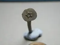 copper roofing nail with star head.webp