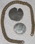 coin chain  holed tag or coin.webp
