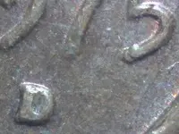 1975 triple d with extra tail on the end of the 5 in date.webp