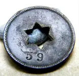 nickel sized token.webp