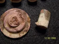 carpet bag lock and pin fire shell.webp