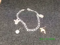 davegoldearring3bobbiesgoldbracelet1.webp