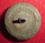 Back of eagle I button after cleaning dug 2-14-09 edited 1.webp