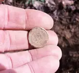 64 reverse in hand.webp