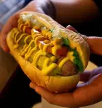 ae-primoe28099s-hot-dog2-390x412.webp