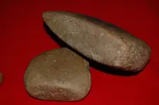 Axe and small grinding stone.webp