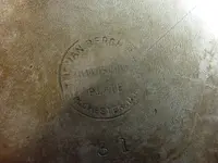 Stamp on bigger plate on back.webp