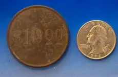 10 dollar token heads.webp