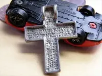 cross on car for size comparison.webp