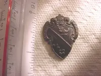 Crest Medallion.webp