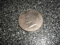 5-5-09 Dollar coin.webp