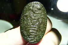 strange pewter button 1.webp