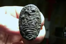strange pewter button 4 .1.webp