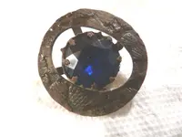 5-24-2009 Brooch with blue gem.webp