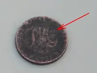 token colonial conder mint mark.webp