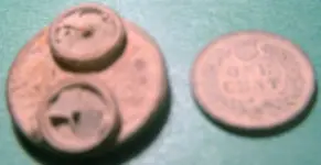 button w. guns back fixed.webp
