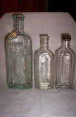 Assort Rawleighs bottles.webp