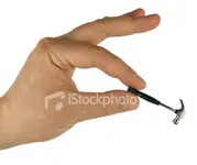 ist2_5468342-hand-holding-small-hammer.webp
