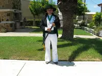 13. Dan Arellano holding his family sword passed down through generations.webp