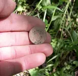 two cent in hand2.webp