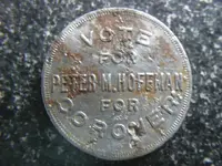 8-4-09 Peter M Hoffman Token 001.webp