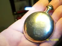 6-13-09 gold watch back cleaned.webp